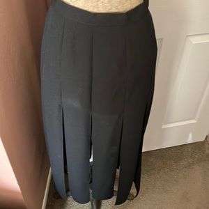 Wind Vane black skirt. British brand Wallis, UK size 12. Dashing and different!